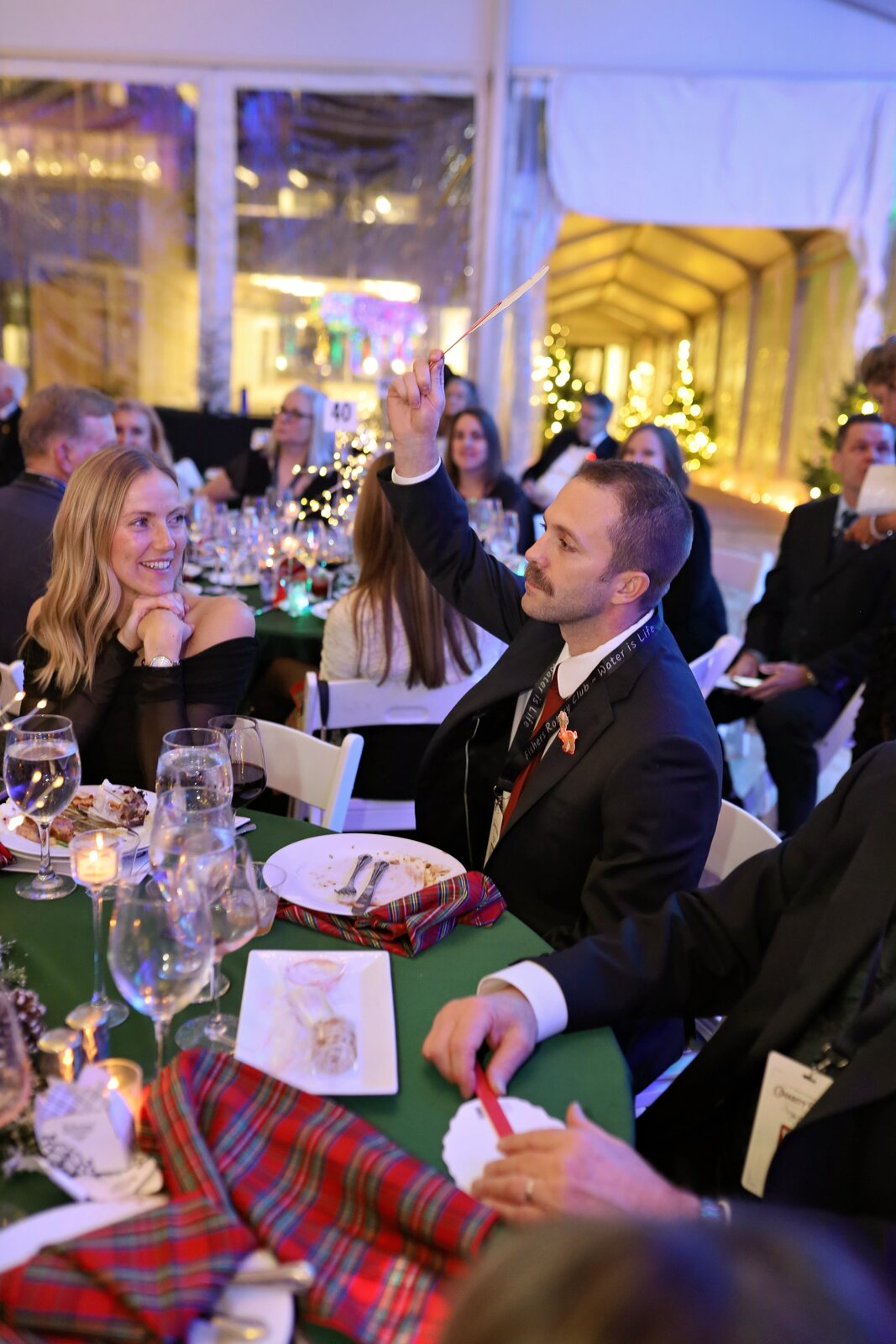 Guests gathered at a dinner table at the 2025 Charity Ball